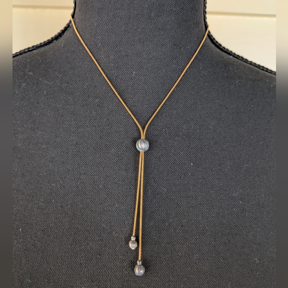 Avon Gold Tone and Silver Bead Necklace